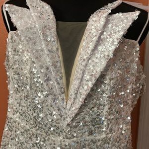 Off shoulder sequin dress.